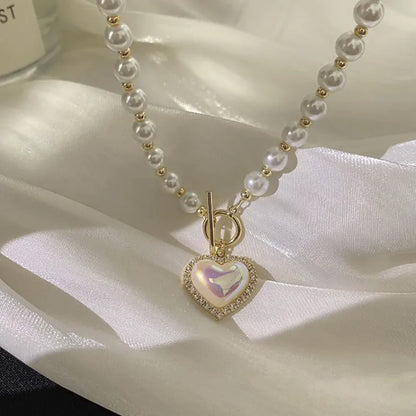 Elegant Pearl Beaded Necklace with Rhinestone Heart Pendant