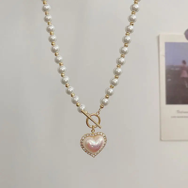 Elegant Pearl Beaded Necklace with Rhinestone Heart Pendant