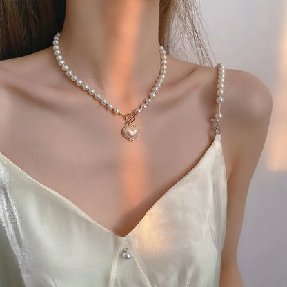 Elegant Pearl Beaded Necklace with Rhinestone Heart Pendant